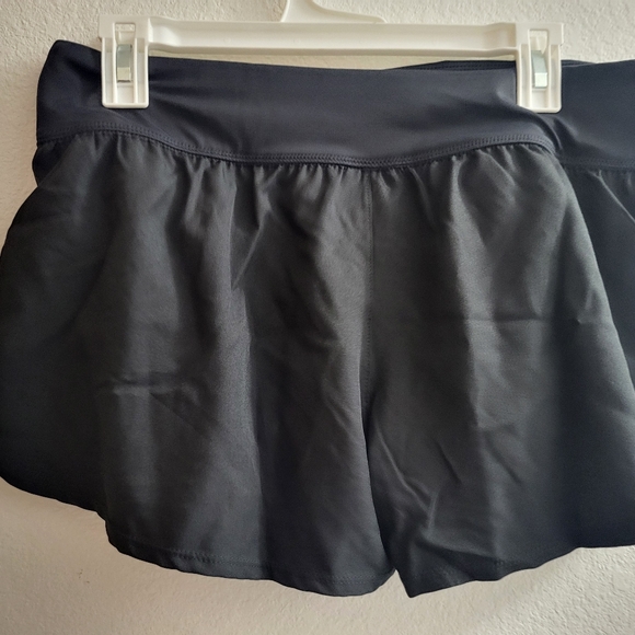 Nike women's swim shorts with built in panty underneath. Size L - Picture 5 of 8